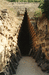 Дромос Царского кургана (около г. Керчь), рядом с Аджимушкаем. Погребение одного из Боспорских царей, вероятнее всего IV в. до н.э. Был ограблен начисто. Высота кургана  15 м. Скорее всего июль или август 2004